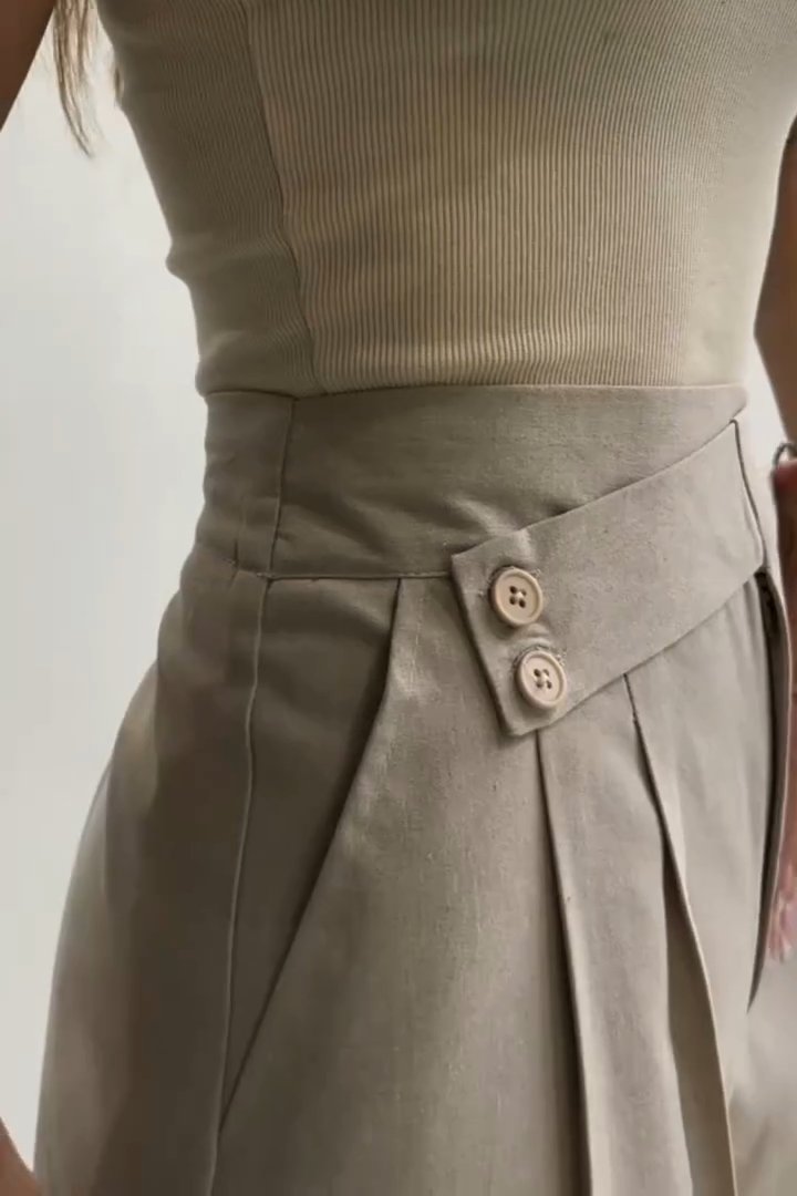 Pantalons larges à taille irrégulière en couleur unie pour femmes